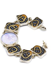 Mix pillpintu zilveren armband